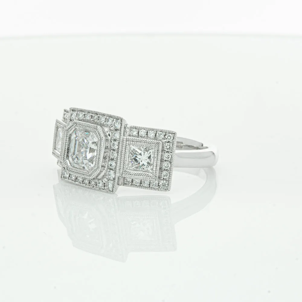 18ct White Gold 1.01ct Emerald Cut Diamond Halo Ring