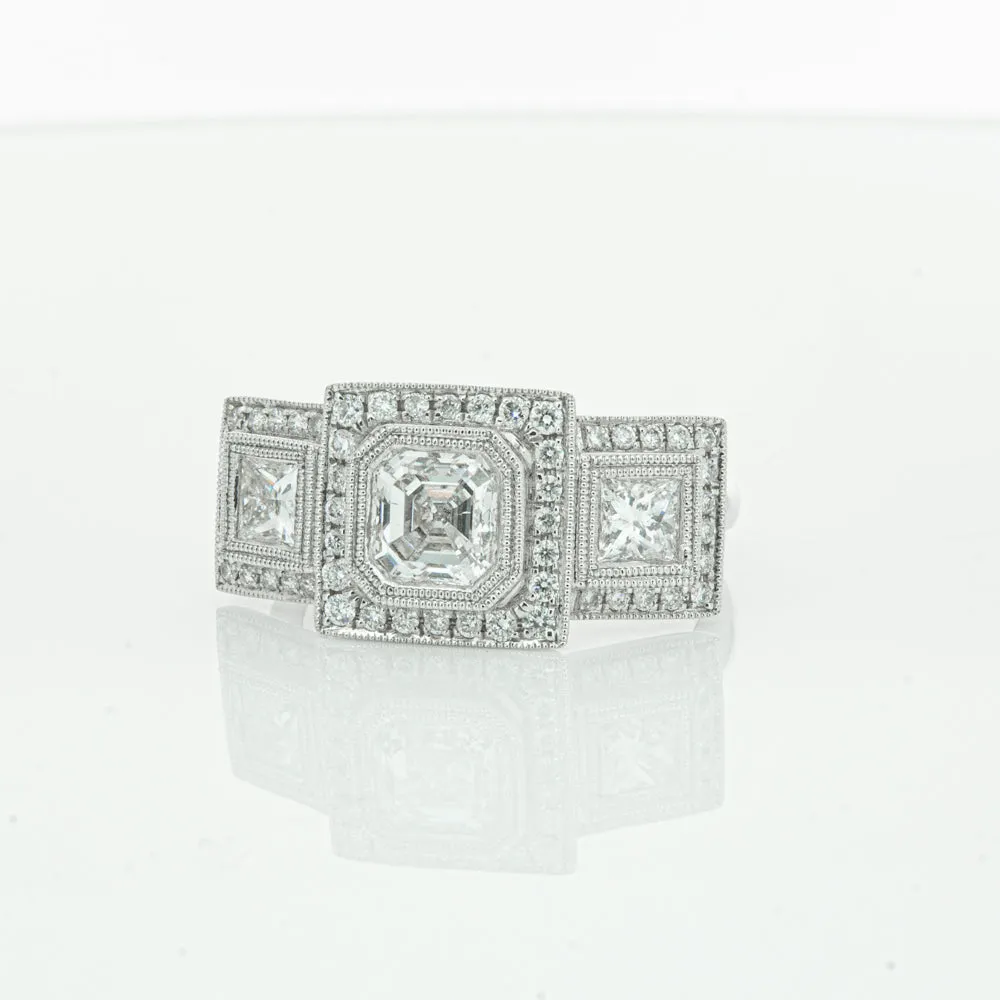 18ct White Gold 1.01ct Emerald Cut Diamond Halo Ring