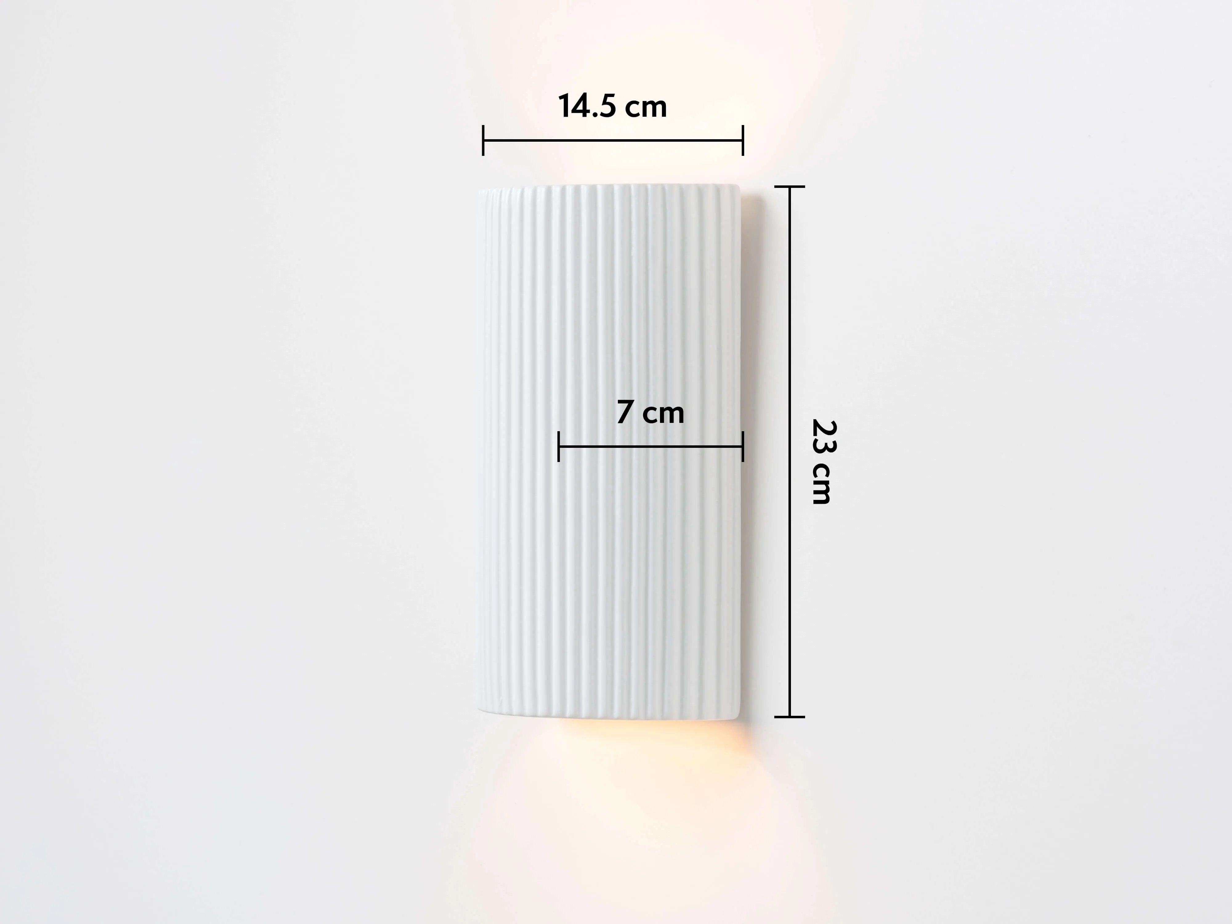 White ribbed ceramic pillar wall light